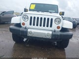 JEEP WRANGLER UNLIMITED SAHARA 1C4HJWEG2CL104811 photo