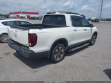 HONDA RIDGELINE RTL-E 5FPYK3F77KB021667 photo