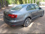 VOLKSWAGEN JETTA 1.4T SE/1.4T WOLFSBURG EDITION 3VWDB7AJ2JM215581 снимка