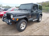 JEEP WRANGLER SAHARA 1J4FA59S81P321733 снимка