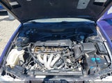 TOYOTA COROLLA CE 1NXBR12E62Z643215 снимка