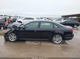 Volkswagen Passat 2.0T Wolfsburg Edition 1VWLA7A3XKC005667 photo