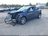 Tesla Model Y Long Range Dual Motor All-Wheel Drive 5YJYGDEE3MF254383 fotografie