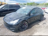 TESLA MODEL Y LONG RANGE DUAL MOTOR ALL-WHEEL DRIVE/PERFORMANCE DUAL MOTOR ALL-WHEEL DRIVE 5YJYGDEF4LF022091 photo