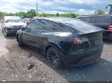 TESLA MODEL Y LONG RANGE DUAL MOTOR ALL-WHEEL DRIVE/PERFORMANCE DUAL MOTOR ALL-WHEEL DRIVE 5YJYGDEF4LF022091 photo