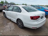 VOLKSWAGEN JETTA 1.4T SE 3VWD67AJ7GM221468 photo