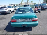TOYOTA COROLLA DX 1NXBB02E4VZ506809 снимка