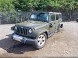 JEEP WRANGLER UNLIMITED SAHARA 1C4HJWEG0FL752152 photo