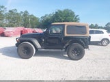 JEEP WRANGLER BLACK AND TAN 4X4 1C4GJXAN1LW146701 photo