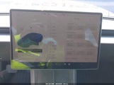 Tesla Model 3 5YJ3E1EA4RF815953 photo