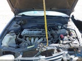 TOYOTA COROLLA CE 1NXBR12E42Z627627 снимка
