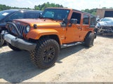 Jeep Wrangler Unlimited Sahara 1J4BA5H15BL588327 fotografie