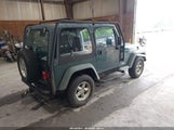 JEEP WRANGLER SPORT 1J4FA49S5YP725979 снимка