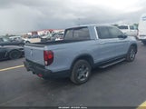 HONDA RIDGELINE RTL-E 5FPYK3F7XPB065203 photo