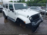 Jeep Wrangler Unlimited Altitude 1C4BJWEG4EL273785 photo