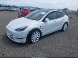 Tesla Model Y Performance Dual Motor All-Wheel Drive 7SAYGDEF9NF399019 photo