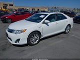 TOYOTA CAMRY HYBRID XLE 4T1BD1FK9CU062047 photo