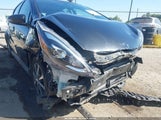 TOYOTA PRIUS C FOUR JTDKDTB35J1606654 photo