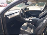 Tesla Model Y Long Range Dual Motor All-Wheel Drive/Rwd 7SAYGDED0RF033356 photo