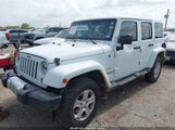 Jeep Wrangler Unlimited Sahara 1C4HJWEG3EL240285 снимка