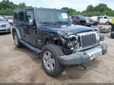 Jeep Wrangler Unlimited Sahara 1J4BA5H16AL130942 снимка