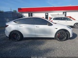 Tesla Model Y Performance Dual Motor All-Wheel Drive 7SAYGDEF1NF523168 photo