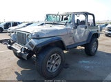 Jeep Wrangler Sport 1J4FA49S3YP734387 снимка