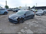 Tesla Model 3 Long Range/Mid Range 5YJ3E1EA8JF025799 снимка