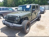 Jeep Wrangler Unlimited Sport 1C4BJWDGXFL571812 fotografie