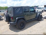 Jeep Wrangler Unlimited Sport 1C4BJWDGXFL571812 снимка