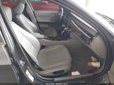 BMW 328Xi WBAVC93577KX54999 снимка