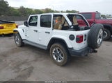 Jeep Wrangler Unlimited Sahara 4X4 1C4HJXEN8JW261176 снимка