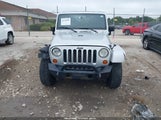 Jeep Wrangler Unlimited Sahara 1J4GA591X8L525995 photo