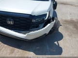 Honda Passport Awd Elite 5FNYF8H09NB018378 photo
