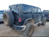 Jeep Wrangler Unlimited Sport 1C4HJWDG7EL259603 снимка