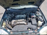 Mazda Protege Dx/Lx JM1BJ2227Y0260567 снимка