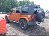 Jeep Wrangler Unlimited Sahara 1J4HB5H14AL232196 fotografie