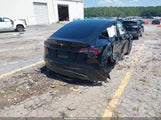 Tesla Model Y Long Range Dual Motor All-Wheel Drive/Rwd 7SAYGDED4RA332118 photo