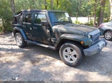 Jeep Wrangler Unlimited Sahara 1J4BA5H17AL187277 снимка