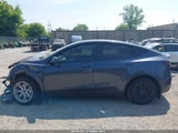 Tesla Model Y Awd/Long Range Dual Motor All-Wheel Drive 7SAYGAEE8PF878556 photo