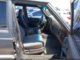 Jeep Cherokee Sport 1J4FT48S21L584877 снимка