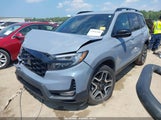 Honda Passport Awd Elite 5FNYF8H09NB000267 photo