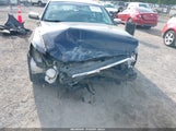 Ford Taurus Limited 1FAHP2F81EG104704 снимка