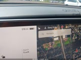 Tesla Model Y Performance Dual Motor All-Wheel Drive 7SAYGDEF6PF705175 photo
