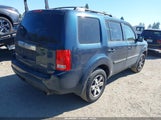 Honda Pilot Touring 5FNYF3H92AB008304 снимка