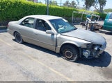Toyota Camry Le JT2BG22KXW0260714 снимка