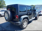 Jeep Wrangler Unlimited Sport 1C4HJWDG8EL309862 fotografie