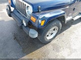 Jeep Wrangler Unlimited 1J4FA44S15P326053 снимка