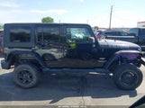 Jeep Wrangler Unlimited Sahara 1C4HJWEG3EL142048 photo