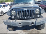 Jeep Wrangler Unlimited Sahara 1C4HJWEG3EL142048 снимка
